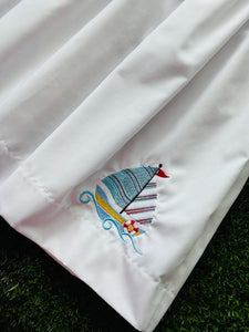 Bethany White Sleeveless Yoke Dress with Red Piping w/Sailboat Applique